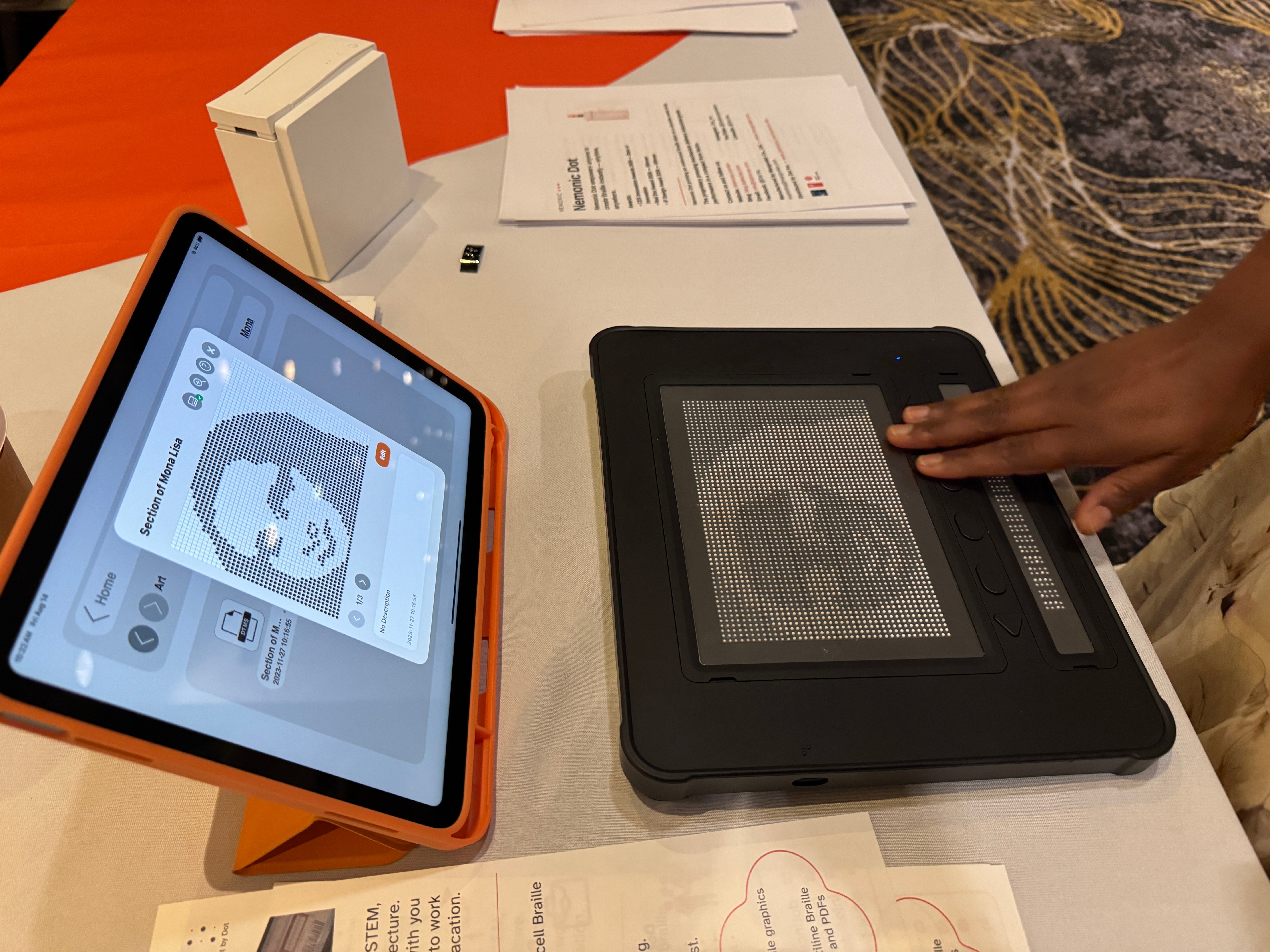 The Mona Lisa displayed on an iPad and as a tactile representation on the Dot Pad
